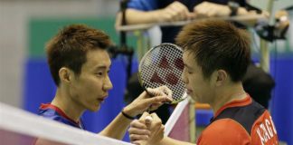 Kenichi Tago (right) congratulating Lee Chong Wei after clinching the Japan Open title in Tokyo on Sunday. Chong Wei beat Tago 23-21, 21-17.