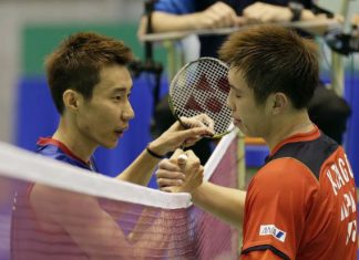 Kenichi Tago (right) congratulating Lee Chong Wei after clinching the Japan Open title in Tokyo on Sunday. Chong Wei beat Tago 23-21, 21-17.