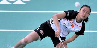 China's Wang Yihan defeated Ratchanok Intanon of Thailand in three tough sets on Saturday to advance to the Denmark Open final.