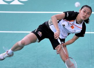 China's Wang Yihan defeated Ratchanok Intanon of Thailand in three tough sets on Saturday to advance to the Denmark Open final.