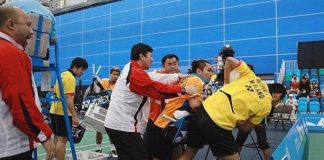 Coaches desperately try to break up the remarkable brawl between the two badminton players during the doubles final of the Canada Open in July