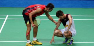 Lee Chong Wei (right) seen here being comforted by China's Lin Dan after the former suffered serious cramping in the final of the World Championships in August, may finally get some much needed rest as a niggling ankle injury may see him skip the final three tournaments of the year.