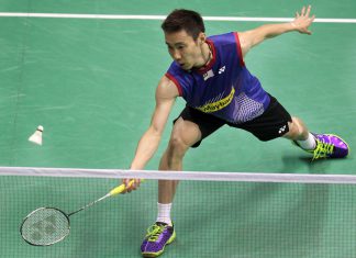 Lee Chong-wei reaches for a return during his opening match against India's Kidambi Srikanth at the Hong Kong Open.