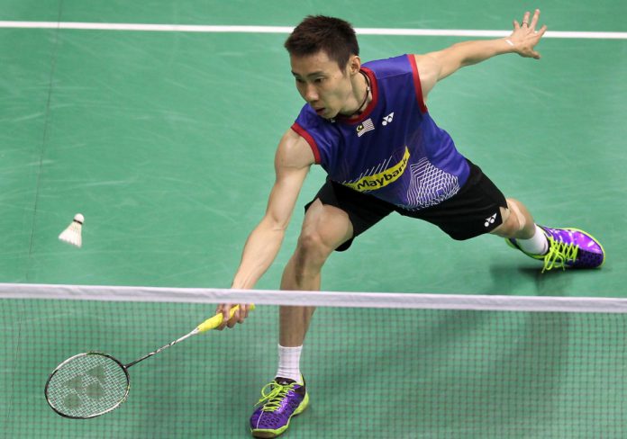 Lee Chong-wei reaches for a return during his opening match against India's Kidambi Srikanth at the Hong Kong Open.
