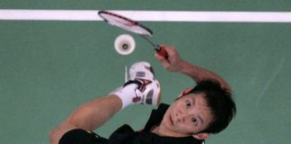 Lift off: Vietnamese badminton ace Nguyen Tien Minh rises to execute a mash. The 30-year-old player desperately seeks his first golden medal at the Southeast Asian Games.