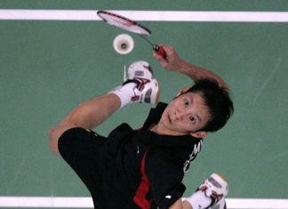 Lift off: Vietnamese badminton ace Nguyen Tien Minh rises to execute a mash. The 30-year-old player desperately seeks his first golden medal at the Southeast Asian Games.