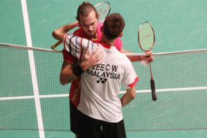 Lee Chong Wei consoles his semi-final opponent from Denmark Jan O Jorgensen after latter retired injured from their match at Putra Stadium on Saturday.