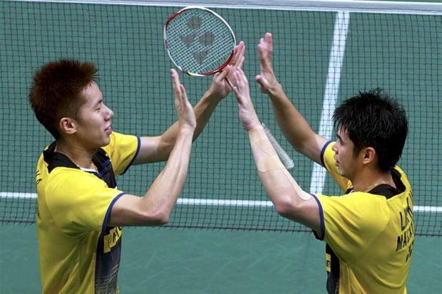 Lim Khim Wah (right) celebrates with Goh V Shem after beating Chinese pair Hong Wei-Chai Biao during the Malaysian Open last Sunday. Lim Khim Wah (right) celebrates with Goh V Shem after beating Chinese pair Hong Wei-Chai Biao during the Malaysian Open last Sunday.