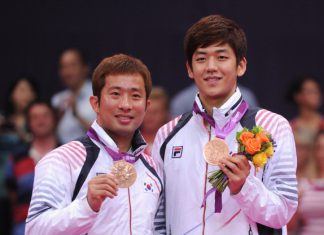 Lee Yong-Dae (right) and Jae Sung Chung of Korea stand with their Bronze medals following the Men’s Doubles Badminton Gold Medal match at the London 2012 Olympics.