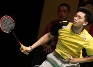 Misbun Ramdan plays in the Maybank Malaysian Open qualifiers as his dad Misbun Sidek looks on from the coach's seat.