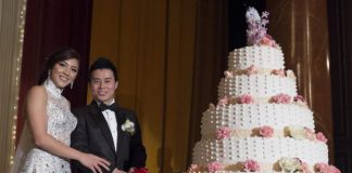 Happy couple: Newlyweds national squash player Delia Arnold and ex-national badminton doubles player Lin Woon Fui cutting the cake at their wedding reception in Sunway on Sunday.