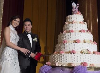 Happy couple: Newlyweds national squash player Delia Arnold and ex-national badminton doubles player Lin Woon Fui cutting the cake at their wedding reception in Sunway on Sunday.