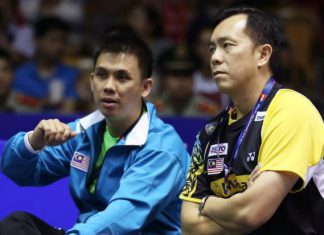 Tan Kim Her (right) seen here with national doubles coach Pang Cheh Chang during the 2012 Thomas Cup championship in China, will know his fate soon as his contract with BAM expires this month.
