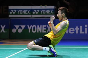 Lee Chong Wei sinks to his knees after winning the All-England men's singles title, beating defending champion Chen Long in straight sets in the final on Sunday. - AFP
