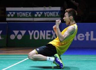 Lee Chong Wei sinks to his knees after winning the All-England men's singles title, beating defending champion Chen Long in straight sets in the final on Sunday. - AFP