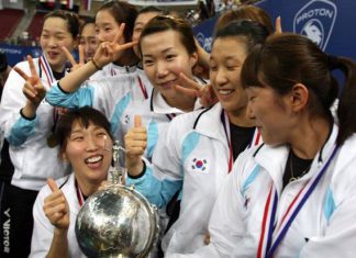 The Korean women's badminton team celebrating with the Uber Cup trophy after shocking China in the final in KL in 2010.