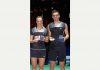 Swiss cheese: Gabby and Chris Adcock smile for the camera after victory