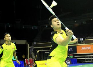Malaysian Open Grand Prix Gold champion - Singapore's Danny Bawa Chrisnanta (left) and Chayut Triyachart in their match against Indonesia's Saputra Albert and Yonathan Suryatama Dasuki at the OUE Singapore Open on April 8, 2014.