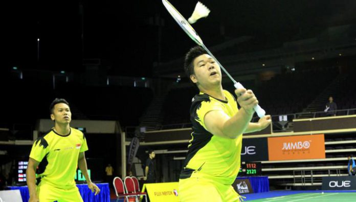 Malaysian Open Grand Prix Gold champion - Singapore's Danny Bawa Chrisnanta (left) and Chayut Triyachart in their match against Indonesia's Saputra Albert and Yonathan Suryatama Dasuki at the OUE Singapore Open on April 8, 2014.