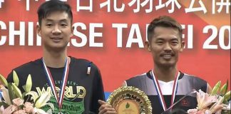 Lin Dan (right) on the podium with Wang Zhengming