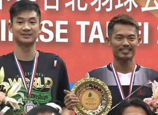 Lin Dan (right) on the podium with Wang Zhengming