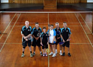 The Norfolk Island Badminton Team hold the Queen's Baton in the badminton court in Norfolk Island on Sunday 22 December 2013.