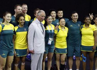 Prince Charles poses with members of the Australia badminton team in the lead up to the Games.