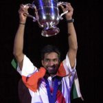 Gopichand holding aloft the All England trophy in 2001