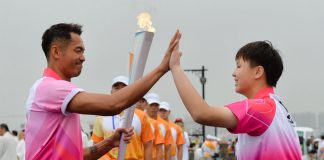 Lin Dan was among the torchbearers of the 2014 Nanjing Youth Olympics torch relay