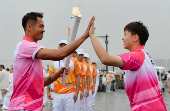 Lin Dan was among the torchbearers of the 2014 Nanjing Youth Olympics torch relay Lin Dan was among the torchbearers of the 2014 Nanjing Youth Olympics torch relay