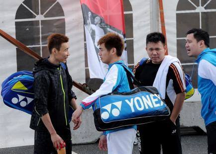Lee Chong Wei (left) and his teammates in Copenhagen.