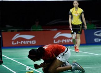 P.V. Sindhu celebrates after her victory against Wang Shixian