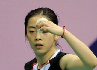 Wang Shixian scores the winning point for China over Malaysia