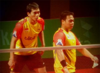 Muhammad Ahsan and Markis Kido play the first men's doubles for Indonesia at the 2014 Axiata Cup