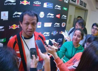 Rexy Mainaky at a press conference