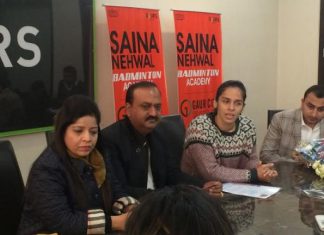 Saina Nehwal (second right) announces her own badminton academy