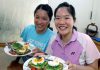 Wish Ng Hui Lin (right) and Ng Hui Ern good luck as they move onto the next stage in their life.