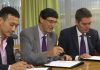 BWF President Poul-Erik Høyer Larsen (right) signs the agreement with Total energy