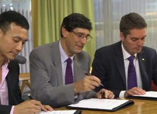 BWF President Poul-Erik Høyer Larsen (right) signs the agreement with Total energy