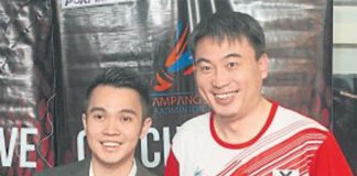 Zhao Jiang Hua (right) and Ho Khek Mong of Ampang Jaya Badminton Club