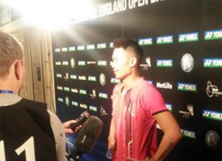 Lin Dan talks to reporters after Thursday's match (photo: Reuters)