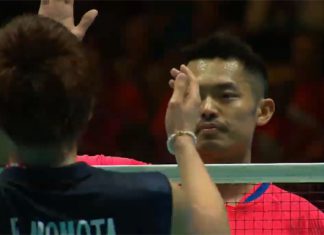 Lin Dan shakes hand with Kento Momota after the match