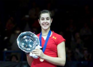 Carolina Marin with the trophy after winning the All England Open