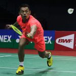 Lin Dan returns a shot from his opponent at India Open