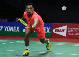 Lin Dan returns a shot from his opponent at India Open