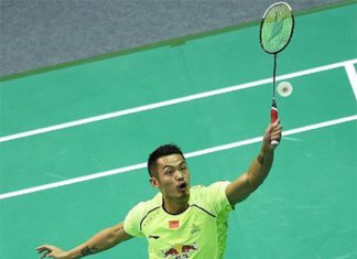 Lin Dan returns a shot at the Badminton Asia Championships