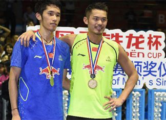 Lin Dan (right) beats Tian Houwei to win his fourth Badminton Asia Championships title on Sunday.