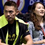 Lin Dan, and his wife Xie Xinfang sit on sidelines watching their teammates in action