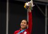 Michelle Li waves to the crowd on the podium after winning the 2015 Pan Am women's singles title. (photo: Peter J. Thompson/National Post)