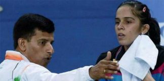 India's badminton ace Saina Nehwal and her coach Vimal Kumar.